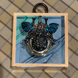 Acrylic Frame with Sparkle Insect on Marbled Paper / Slight Imperfections