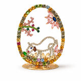 Decorative item with multicolored gemstones on a white background